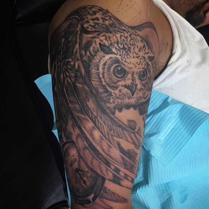 Realisticowltattoo