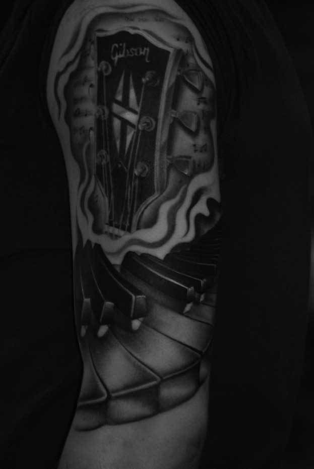 Gibson-guitar-piano-keys-music-rosemary-mckevitt-tattoo-ireland