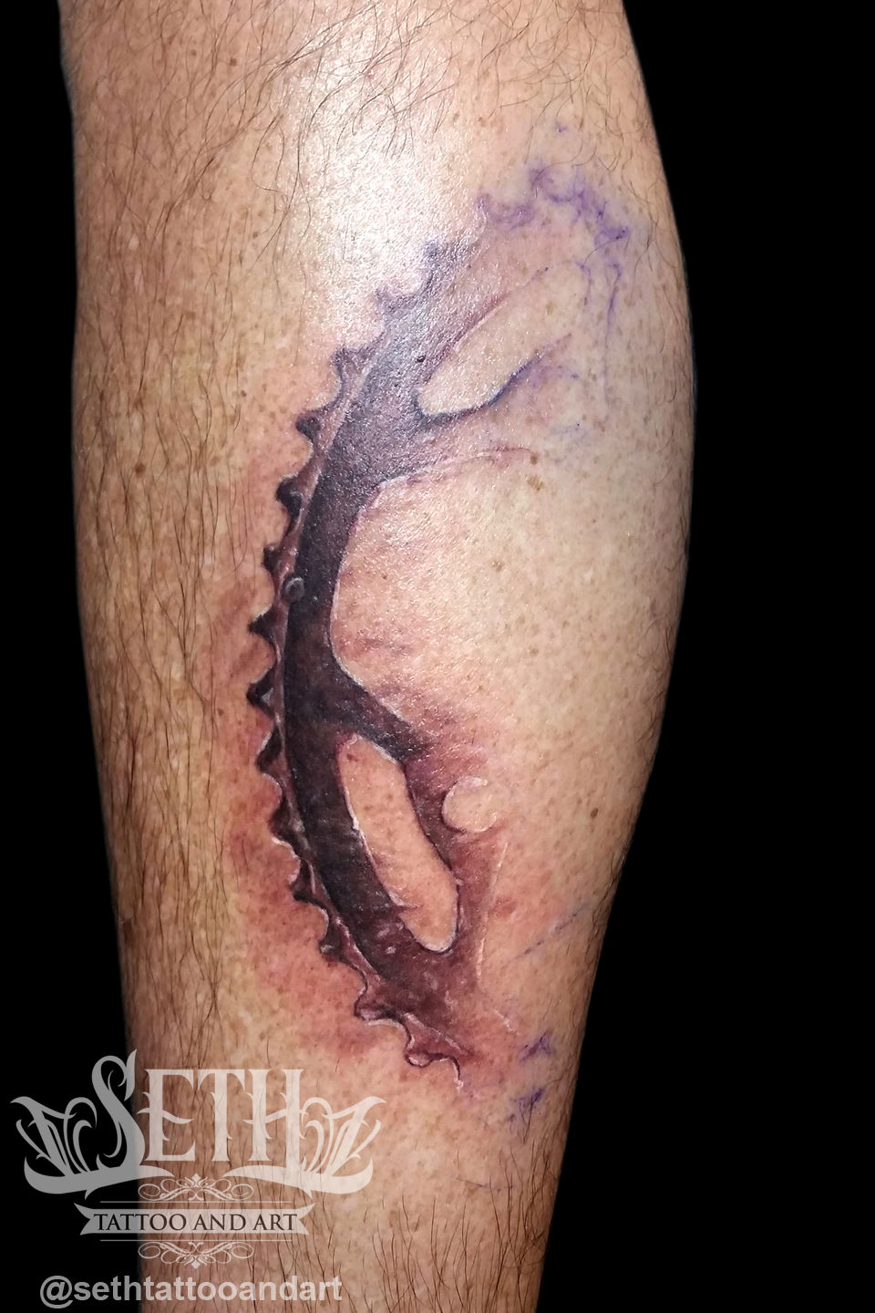 Bicycle_sprocket_tattoo_realism_realistic_seth_tattoo_3d_hyper_realism_tattoo_shop_ink_inked_tattoo_artist