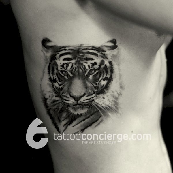 Tiger-portrait---delicate-ink-brush-side-torso-body-art---black-and-gray-watercolor---the-tattoo-concierge---global-platform