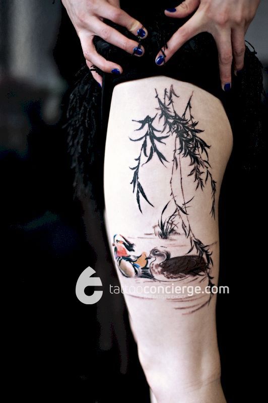 Classically-inspired-chinese-watercolor-pond-scene---upper-thigh-body-art---the-tattoo-concierge---global-platform