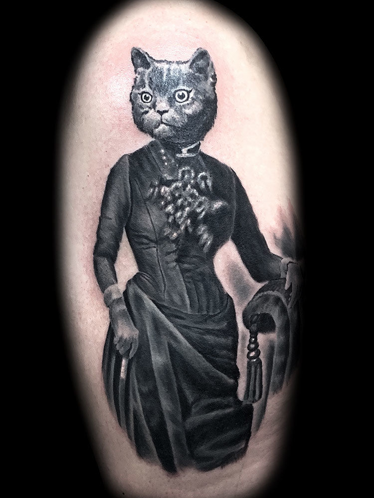 Inner-visions-best-tattoo-shops-in-las-vegas-famous-tattoo-artist-joe-riley-cat-tattoos