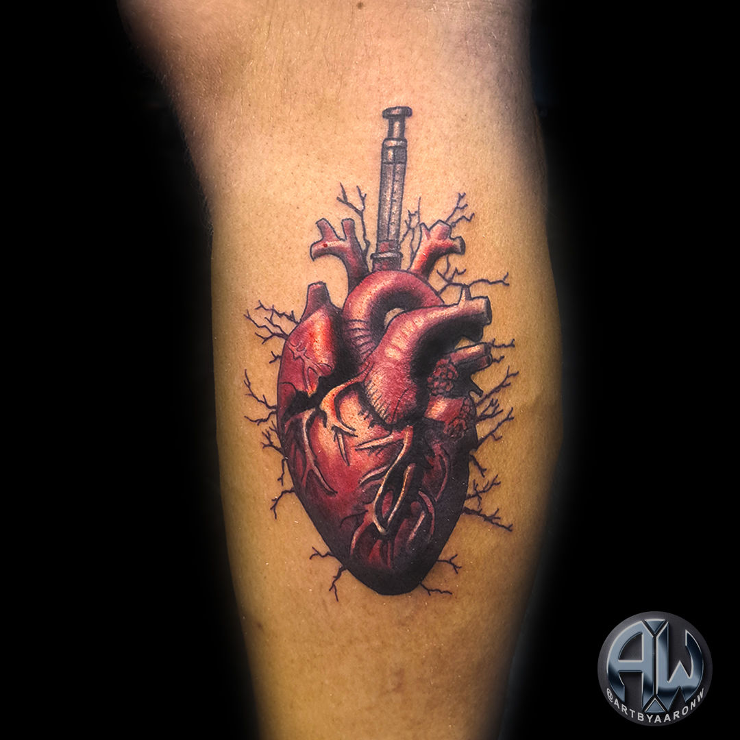 Ig_tattoos_2023_orlando_heart_syringe
