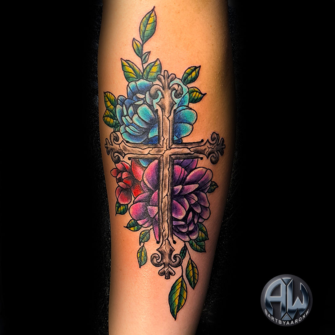 Ig_tattoos_2023_stone_cross_and_flowers
